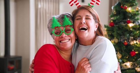 Playful Holiday Bonding: Mother and Daughter Embracing