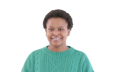 Person expressing frustration in green sweater on white background