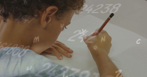 Focused Student with Numbers and Letters Overlaying - Download Free Stock Images Pikwizard.com