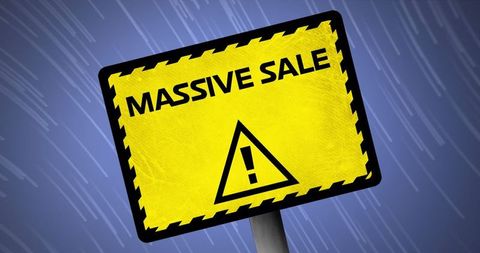 Massive sale sign in front of blue illustrated background