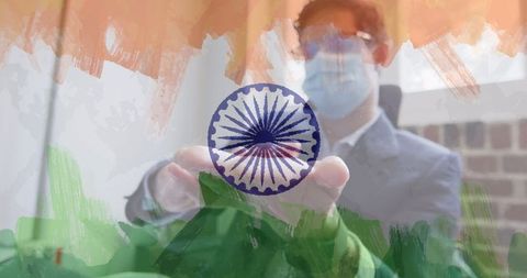 Businessman disinfecting hands over indian flag symbol
