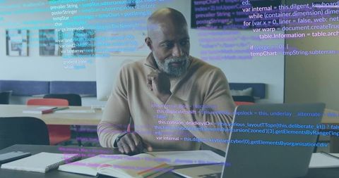 Professional Concentrated on Code, Analyzing Data at Office Laptop