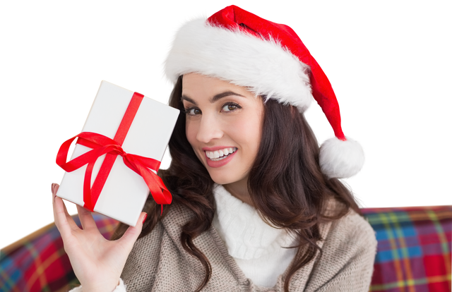 Smiling Woman Holding Christmas Gift in Santa Hat on Transparent Background - Download Free Stock Videos Pikwizard.com