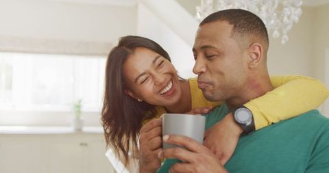 Smiling Couple Enjoying Leisure Time Together at Home