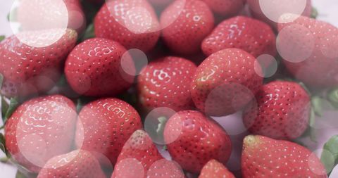 Lively red strawberries with bokeh effects