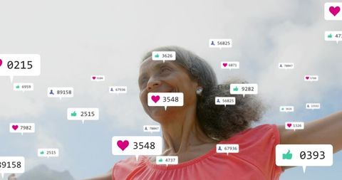 Senior woman celebrating outdoors with social media likes and follower icons