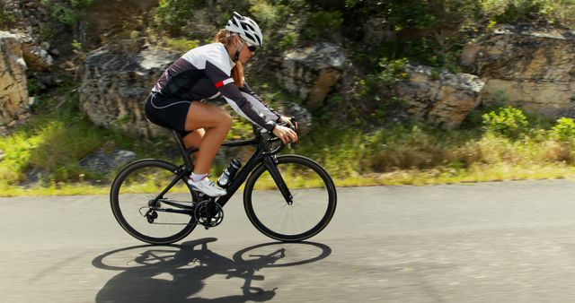 Fit Athlete Cycling on Road Bike in Countryside - Download Free Stock Images Pikwizard.com