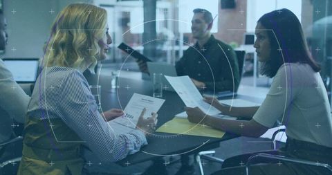 Team conducting business panel interview in modern workspace