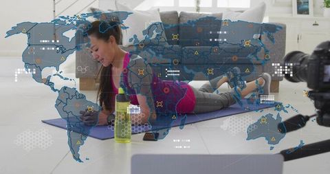 Korean trainer demonstrating forearm plank home workout with camera and map overlay