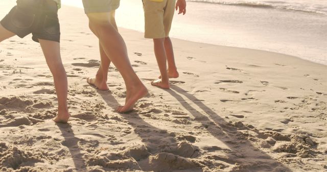 Family Walking Barefoot on Sandy Beach - Download Free Stock Images Pikwizard.com