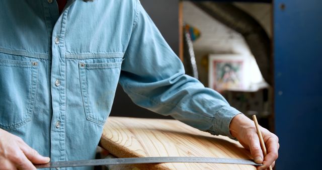 Craftsman Measuring Wooden Plank for Furniture Making - Download Free Stock Images Pikwizard.com