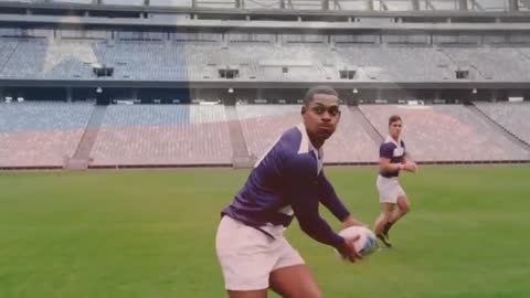 Rugby Players Practicing on Stadium Field Demonstrating Teamwork