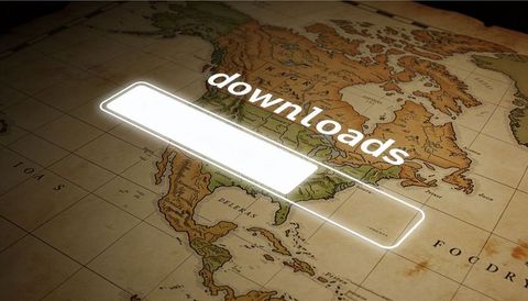 Glowing download progress bar casting soft light over vintage parchment world map
