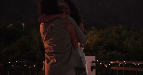 Romantic Proposal at Night Under Twinkling Lights