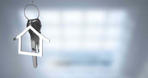 Silver Key with House Fob Symbolizing Real Estate Ownership