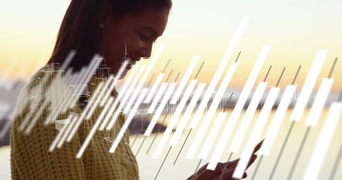 Woman Analyzing Mobile Data with Financial Graphs Imagery