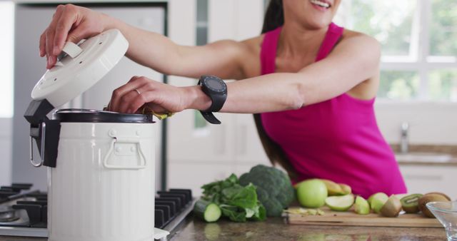 Woman in Pink Tank Top Using Modern Kitchen Container - Download Free Stock Images Pikwizard.com