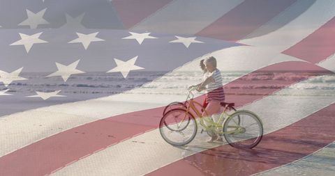 Boy Biking on Beach with Patriotic American Flag Overlay