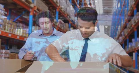 Warehouse Supervisors Analyzing Logistics with Financial Data Overlay - Download Free Stock Images Pikwizard.com
