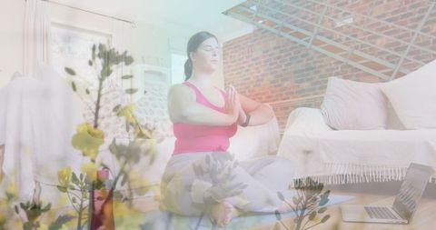 Caucasian Woman Practicing Yoga Indoors with Floral Overlay