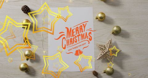 Christmas Greeting with Ornaments on Wooden Tabletop