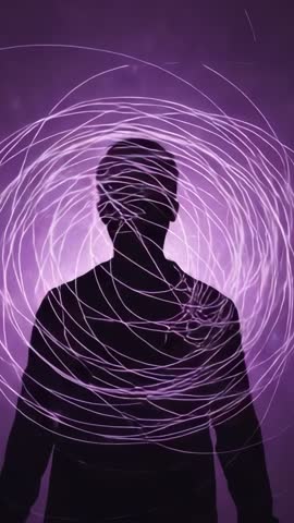Silhouette Being Enveloped by Swirling Purple Light Trails Projecting Futuristic Vertical Video