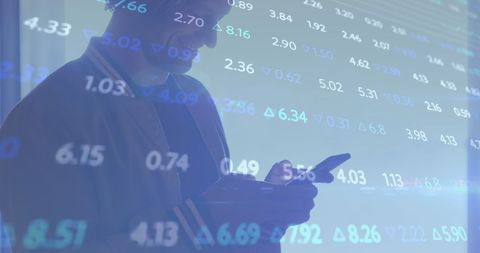 investing on the go: man trading stocks via smartphone - Download Free Stock Images Pikwizard.com