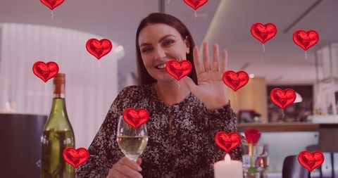 Happy Woman Enjoying Virtual Date With Wine and Heart Icons