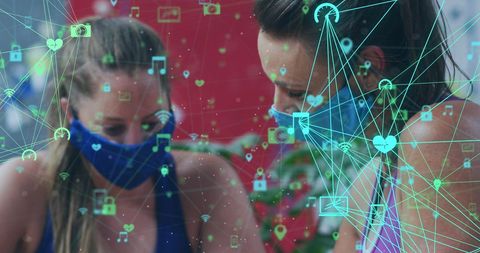 Women Discuss Digital Data Connectivity While Wearing Masks - Download Free Stock Images Pikwizard.com