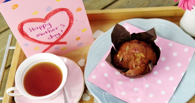 Mother's Day Breakfast with Cupcake and Tea on Tray - Download Free Stock Images Pikwizard.com