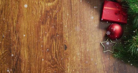 Festive Wooden Background with Christmas Ornament and Gift - Download Free Stock Images Pikwizard.com