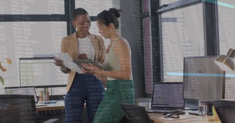 Innovative Professionals Analyzing Digital Financial Reports in Modern Office - Download Free Stock Images Pikwizard.com
