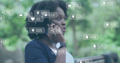 Woman engaged with augmented reality in city park