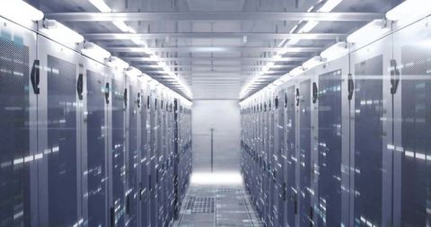 Modern Data Center Interior with Server Racks and LED Lighting