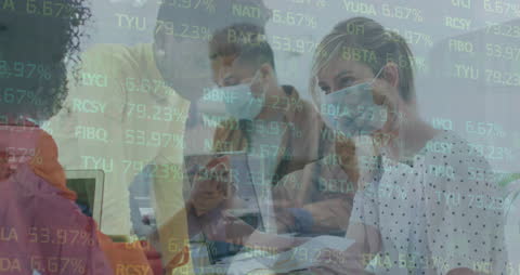 Financial Experts Analyzing Data Amid Pandemic Precautions