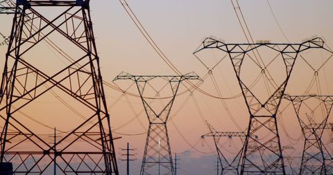High Voltage Electricity Poles at Sunset Silhouette - Download Free Stock Images Pikwizard.com