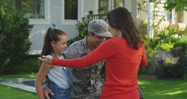 Military Father Reuniting with Family Outside House - Download Free Stock Images Pikwizard.com