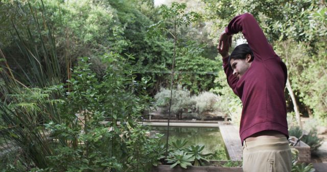 Man Stretching in Green Garden Outdoor Exercise - Download Free Stock Images Pikwizard.com