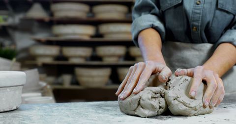 Hands Shaping Clay in Pottery Workshop Showcasing Craftsmanship - Download Free Stock Images Pikwizard.com
