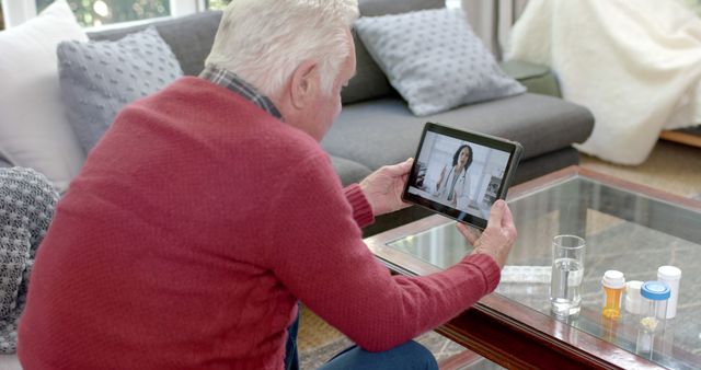 Senior Man Having Virtual Doctor Consultation On Tablet At Home - Download Free Stock Images Pikwizard.com