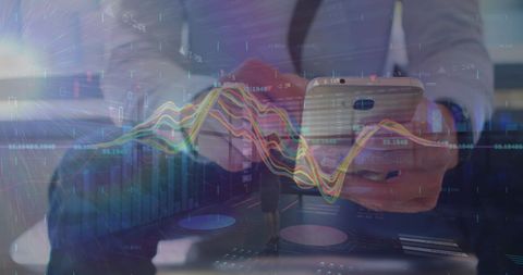 Businessman Analyzing Digital Financial Graphs on Smartphone