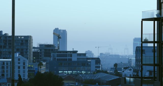 General view of cityscape with multiple modern buildings and cloudless sky - Download Free Stock Photos Pikwizard.com