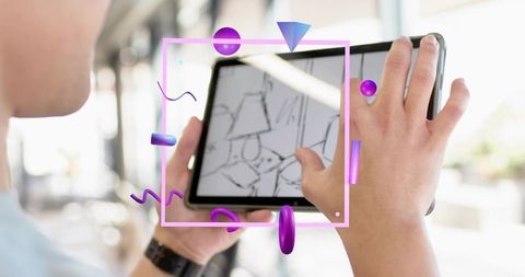 Holding tablet on commuter train tapping screen with ar sketch overlay and 3d accents