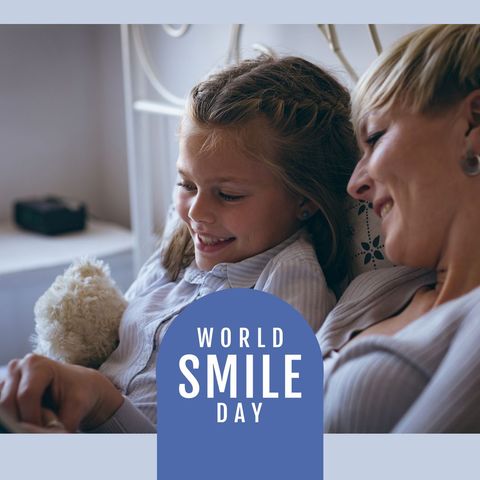 Mother and daughter celebrating world smile day