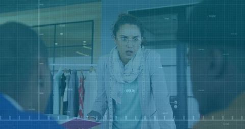 Fashion designer leading creative studio meeting