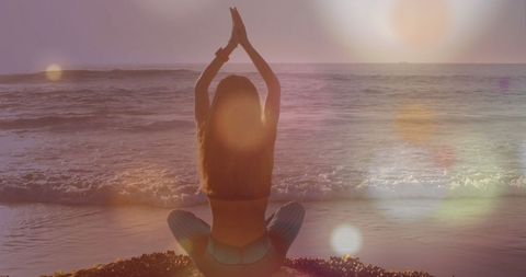 Peaceful Beach Meditation at Sunset with Digital Light Effects - Download Free Stock Images Pikwizard.com