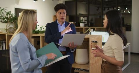 Focused Business Team Engaging in a Collaborative Discussion in Modern Office