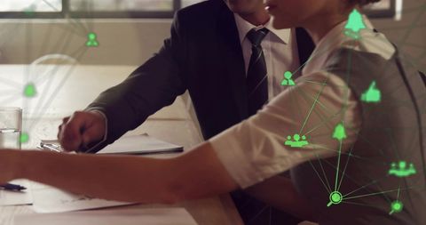 business colleagues analyzing digital network connections in office - Download Free Stock Images Pikwizard.com