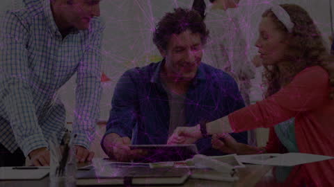 Collaborative Office Team Analyzing Digital Network