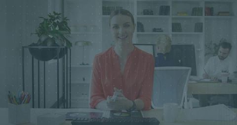 Confident Businesswoman Communicating in Modern Office Workspace